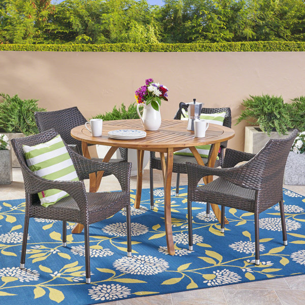 Highland Dunes Caban Round 4 Person Outdoor Dining Set Wayfair